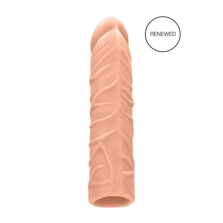 REALROCK 17.8 cm Penis Extender Sleeve in Flesh, the sleeve alone marked with a RENEWED badge