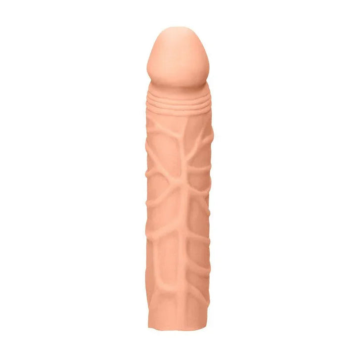 REALROCK 17.8 cm Penis Extender Sleeve in Flesh, front view standing upright on white