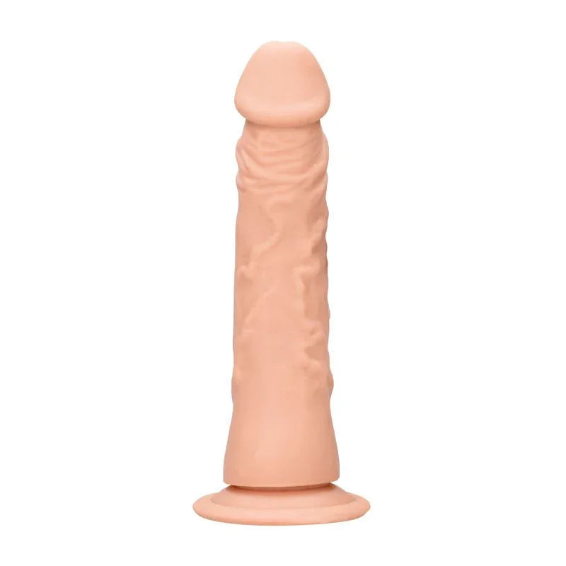 REALROCK 17.8 cm Realistic Dildo in Flesh, front view standing upright on its suction base