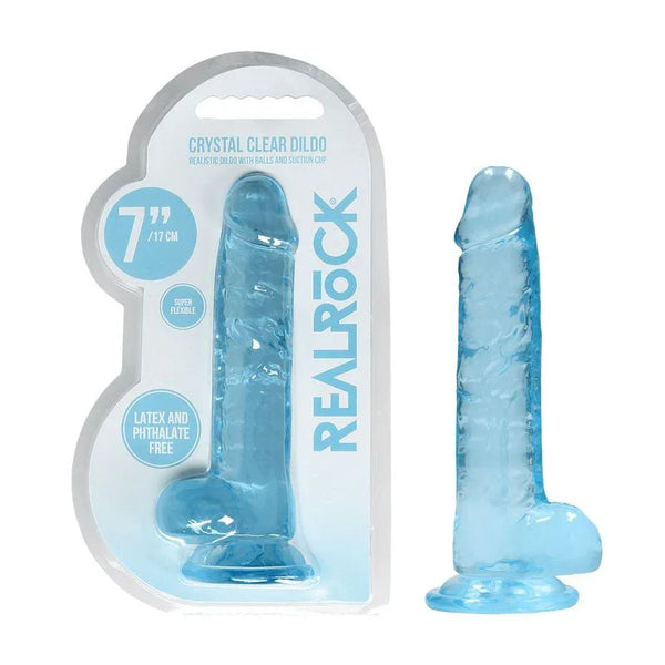 REALROCK 17.8 cm Realistic Dildo with Balls in Blue, blister pack beside the jelly-clear dildo
