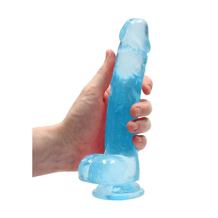 REALROCK 20.3 cm Realistic Dildo with Balls in Blue, held in one hand to show its girth