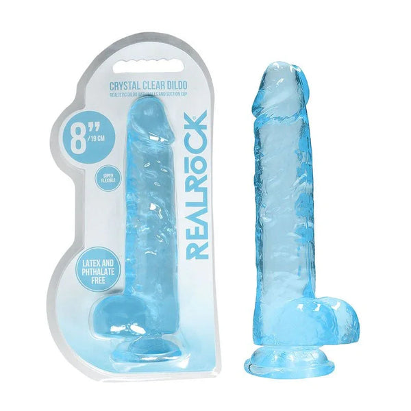 REALROCK 20.3 cm Realistic Dildo with Balls in Blue, blister pack beside the jelly-clear dildo
