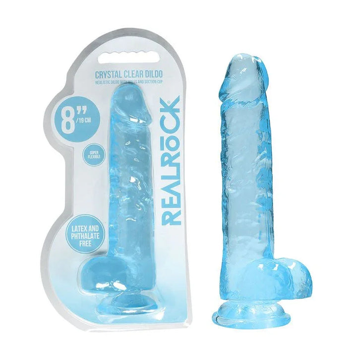 REALROCK 20.3 cm Realistic Dildo with Balls in Blue, blister pack beside the jelly-clear dildo