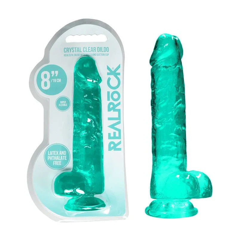 REALROCK 20.3 cm Realistic Dildo with Balls in Turquoise, blister pack beside the jelly-clear dildo