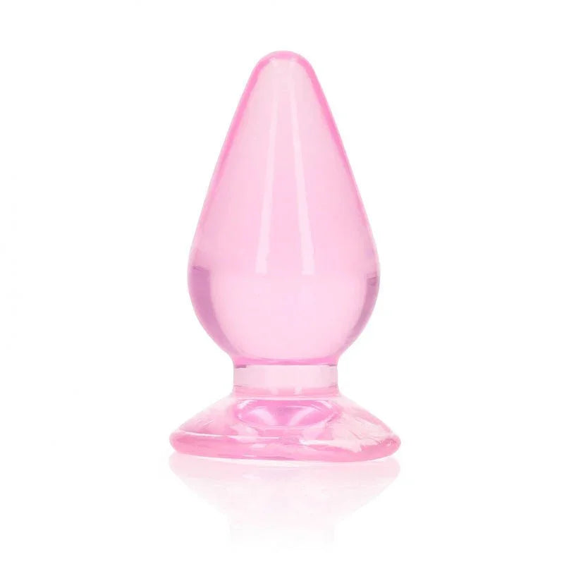 REALROCK 9 cm Anal Plug in Pink, translucent tapered plug upright on its flared base