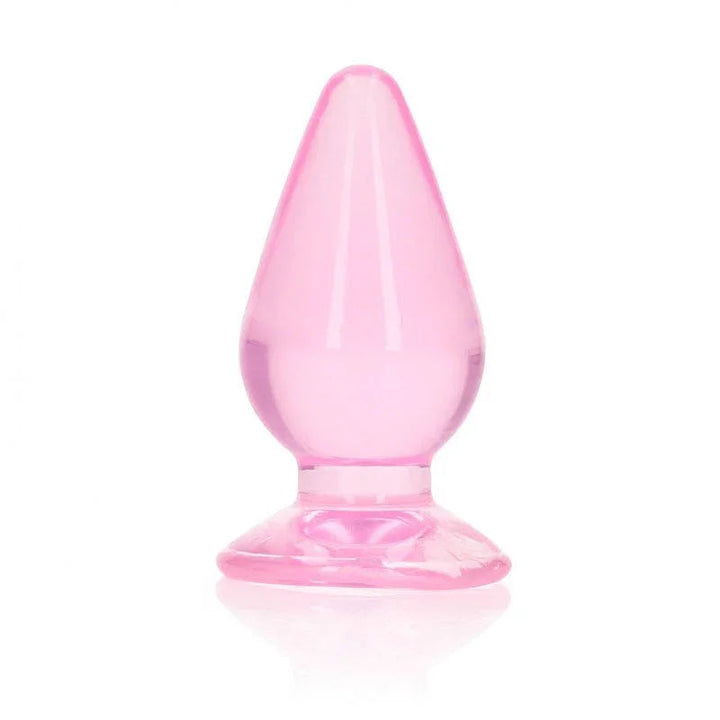 REALROCK 9 cm Anal Plug in Pink, translucent tapered plug upright on its flared base