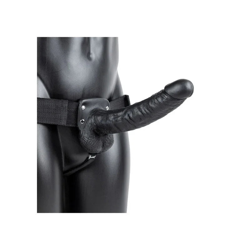 REALROCK 23 cm Hollow Strap-On with Balls in Black, worn on a black mannequin, front three-quarter