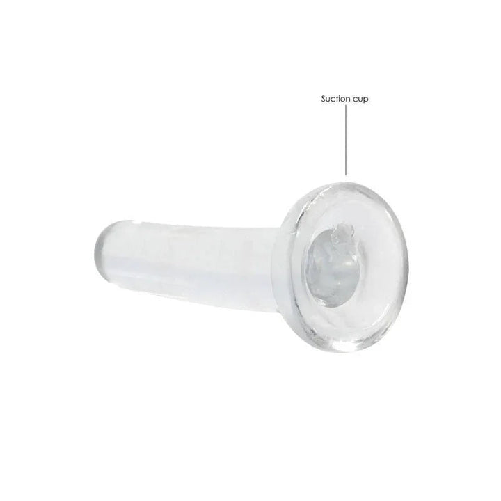 REALROCK 13.5 cm Non-Realistic Dildo in Clear, lying flat with the suction cup labelled