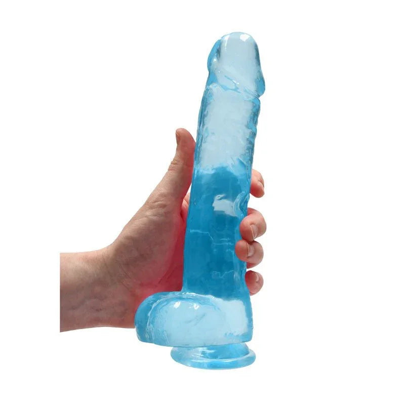 REALROCK 22.9 cm Realistic Dildo with Balls in Blue, held in one hand to show its girth