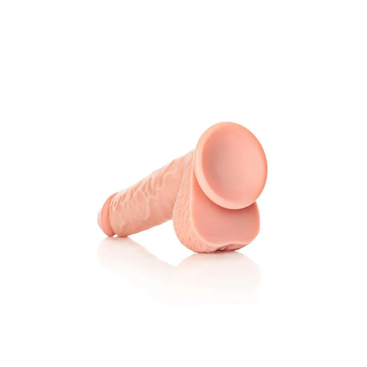 REALROCK Straight Realistic Dildo with Balls - 23 cm - Flesh 23 cm (9'') Dong – Sex toys NZ by Naughtyhut. Discreet delivery nationwide.