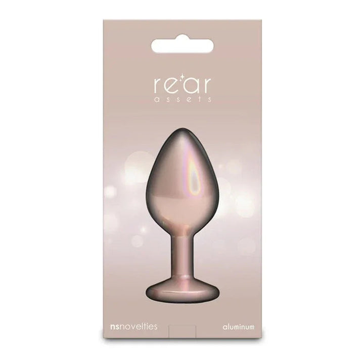 Rear Assets box in champagne, single plug pictured in silhouette on the card