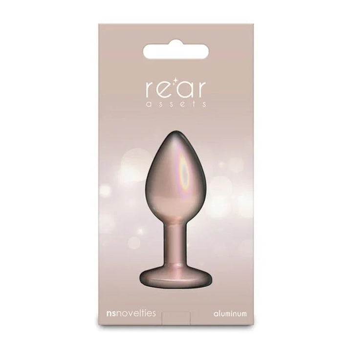 Rear Assets small box in champagne, single plug pictured in silhouette on the card