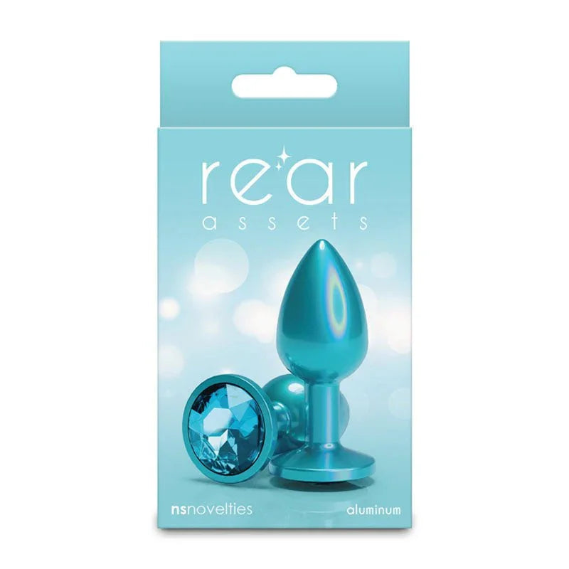 Rear Assets small box in teal, picturing the plug and its blue round gem base