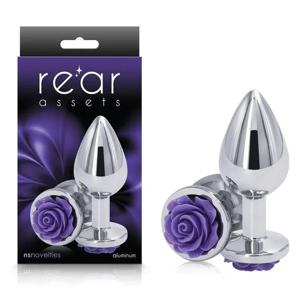 Rear Assets Rose medium plug in Chrome with a purple rose base, beside its box