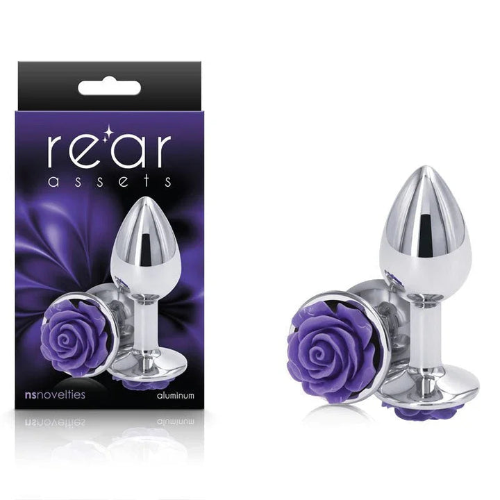 Rear Assets Rose plug in Chrome with a purple rose base, beside its Rear Assets box