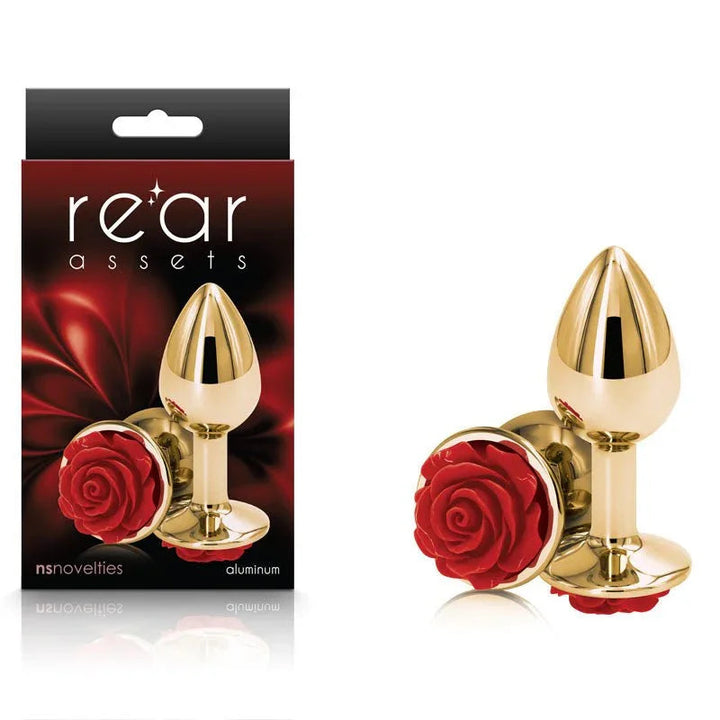 Rear Assets Rose plug in Gold with a red rose base, beside its Rear Assets box