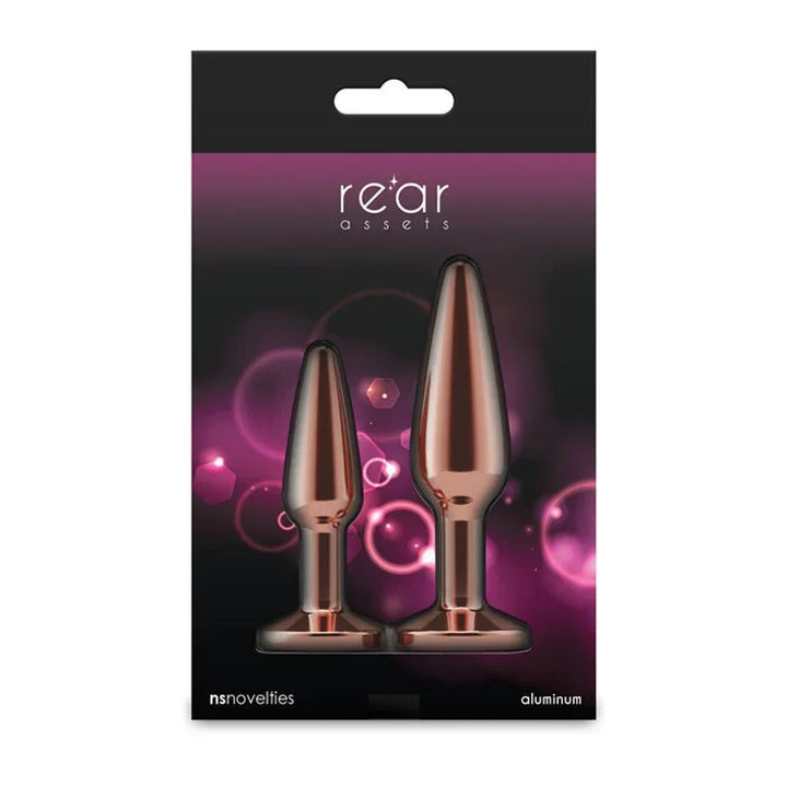 Rear Assets Tapered Trainer Kit box in pink, two rose gold plugs pictured on the card