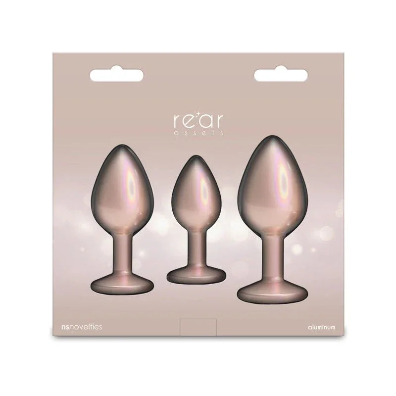 Rear Assets Trainer Kit box in champagne, three plugs pictured without the kit label