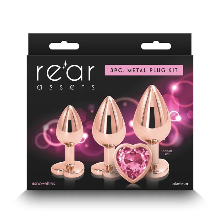 Rear Assets Trainer Kit box front in Rose Gold, three metal plugs and a pink heart gem