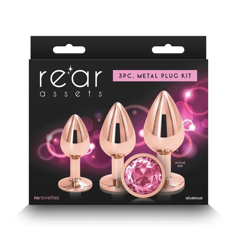 Rear Assets Trainer Kit box in black, Rose Gold plugs and pink gem on the 3pc kit label