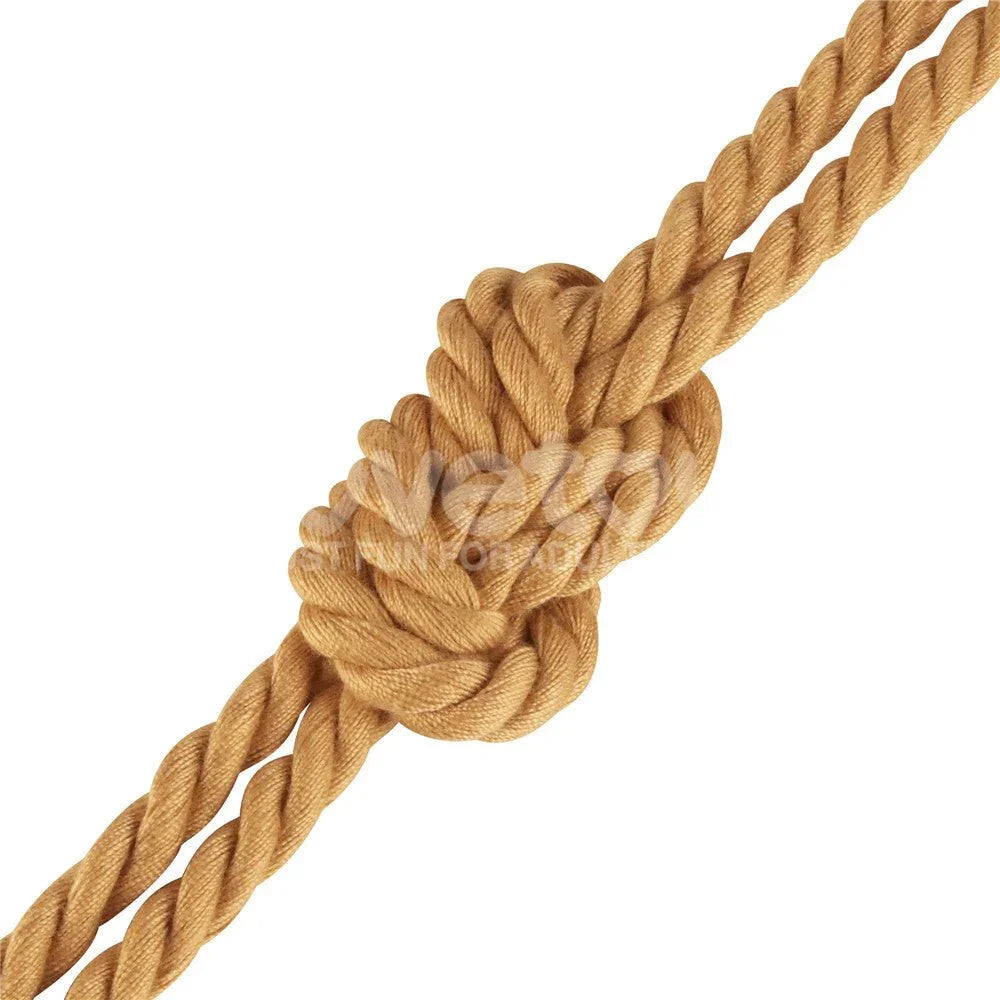 Knot tied in the natural rope, showing the coarse three-strand twist