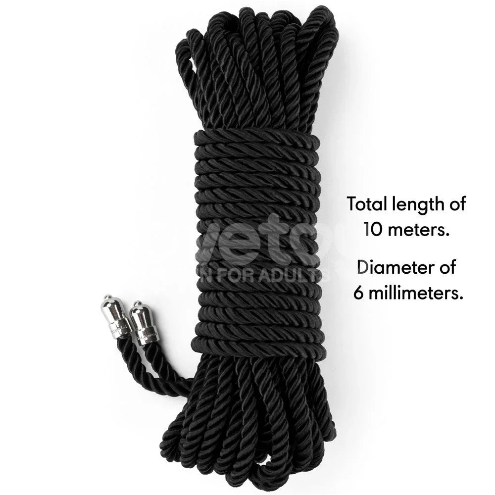Coiled black Rebellion Reign rope with a note that it is 10 metres long and 6 mm thick