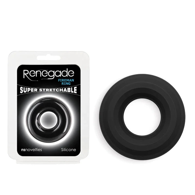 Renegade Fireman Ring medium in Black, thick smooth ring beside its blister pack