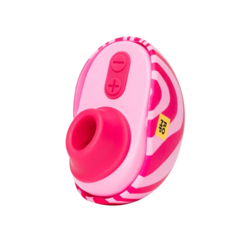 Romp Spin clitoral suction vibrator in pink candy-swirl pattern, front view