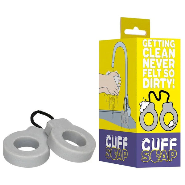 S-LINE Cuff Novelty Soap Bar in Grey, yellow Cuff Soap carton beside the two ring-shaped soaps