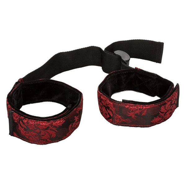 Scandal Bicep Restraint, red brocade cuffs joined by black strap