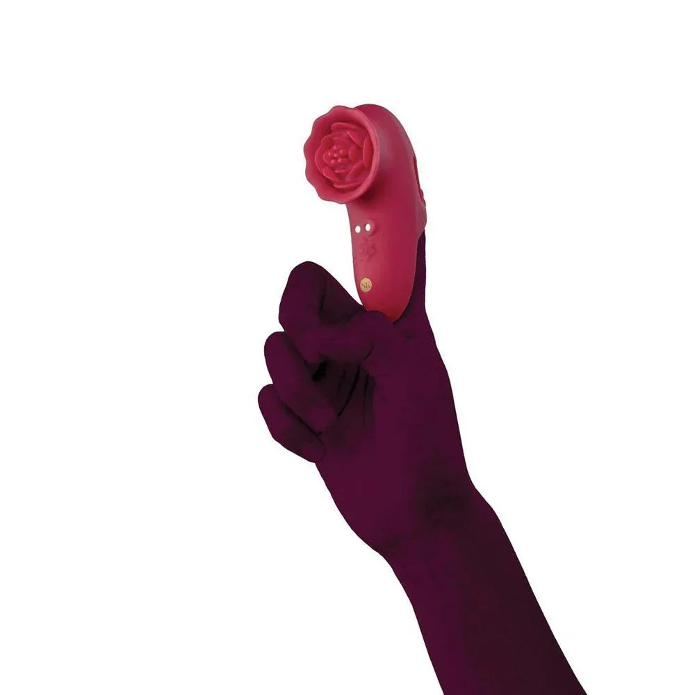 Secret Kisses Playful Petal finger vibe held in a silhouetted hand, rose head upward
