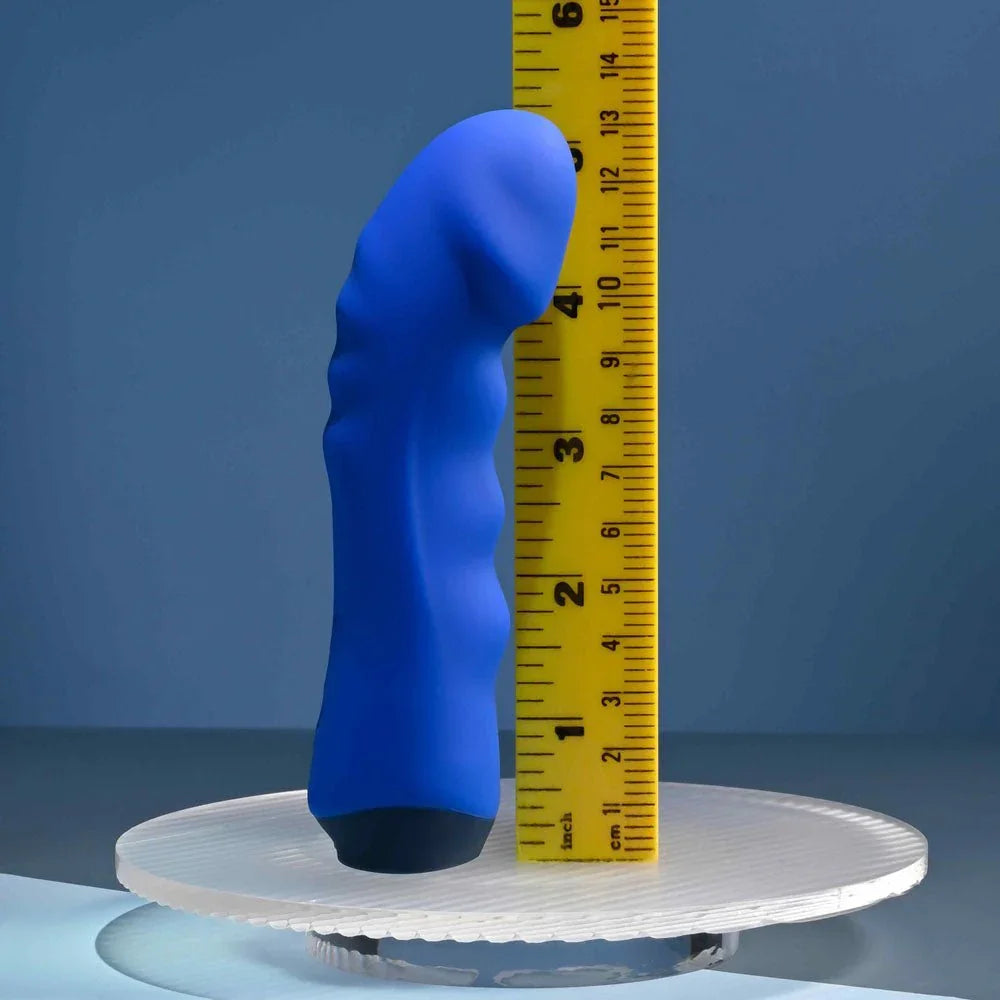 Blue Banger stood beside a ruler to show its 13.6 cm length