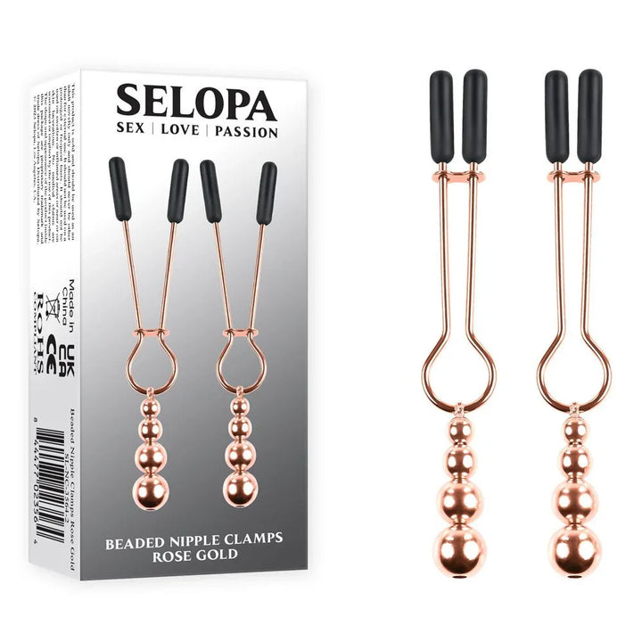Selopa Beaded Nipple Clamps box beside the two rose gold clamps with bead tails