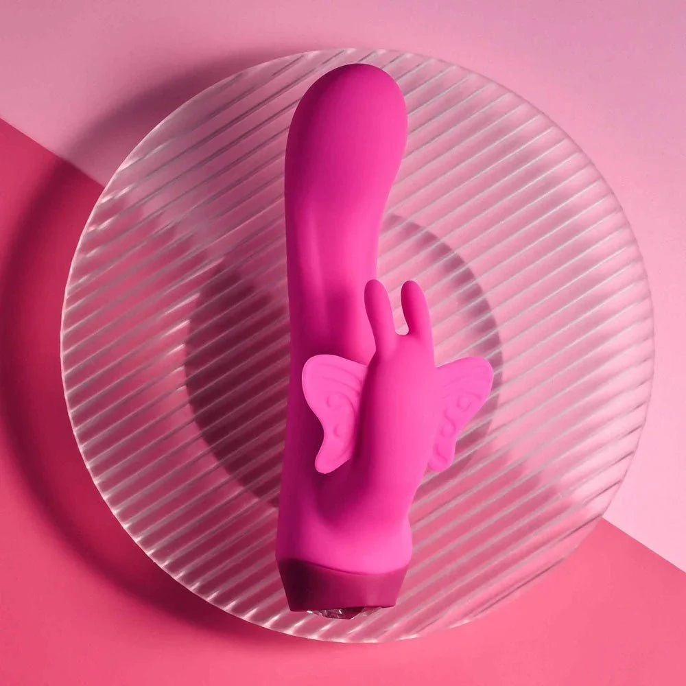 Butterfly Love on a ribbed glass disc, butterfly clitoral arm facing forward