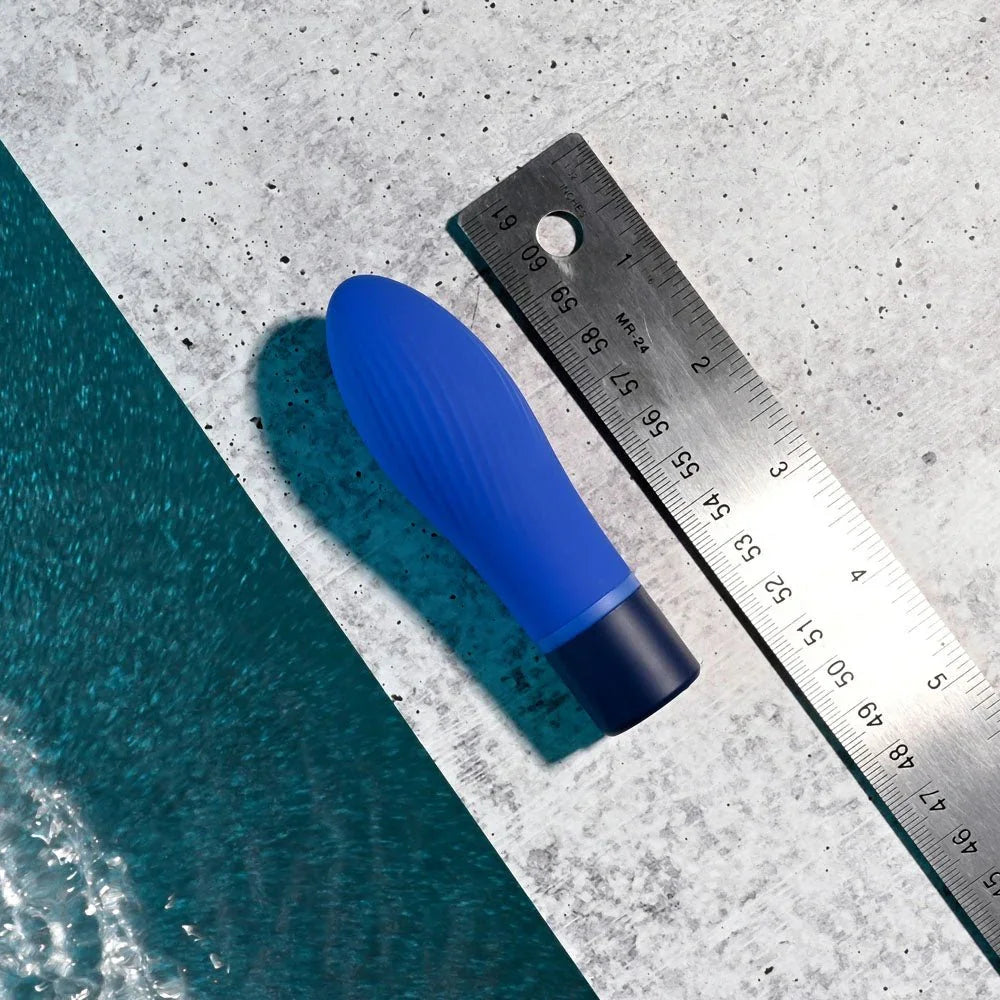 Cobalt Cutie laid beside a steel ruler to show its length