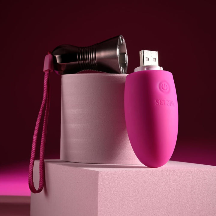 Selopa COMPANION - Pink 11.9 cm USB Rechargeable Vibrating Egg – Sex toys NZ by Naughtyhut. Discreet delivery nationwide.