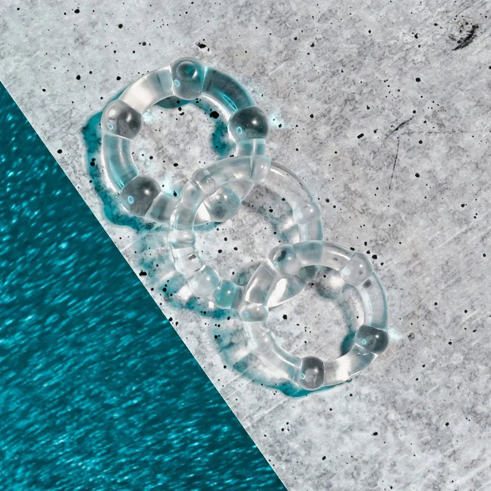 The three erection rings overlapping at the edge of the water on concrete