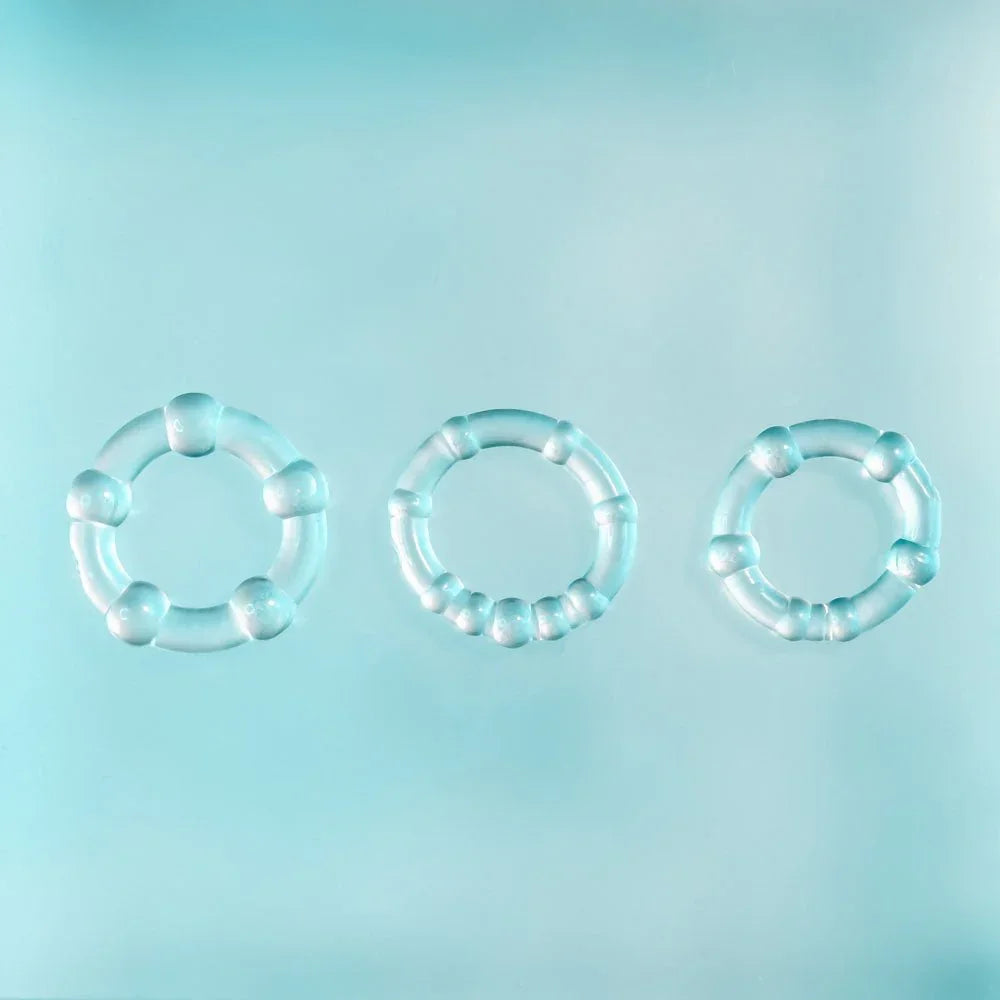 The three clear beaded erection rings laid side by side, largest to smallest