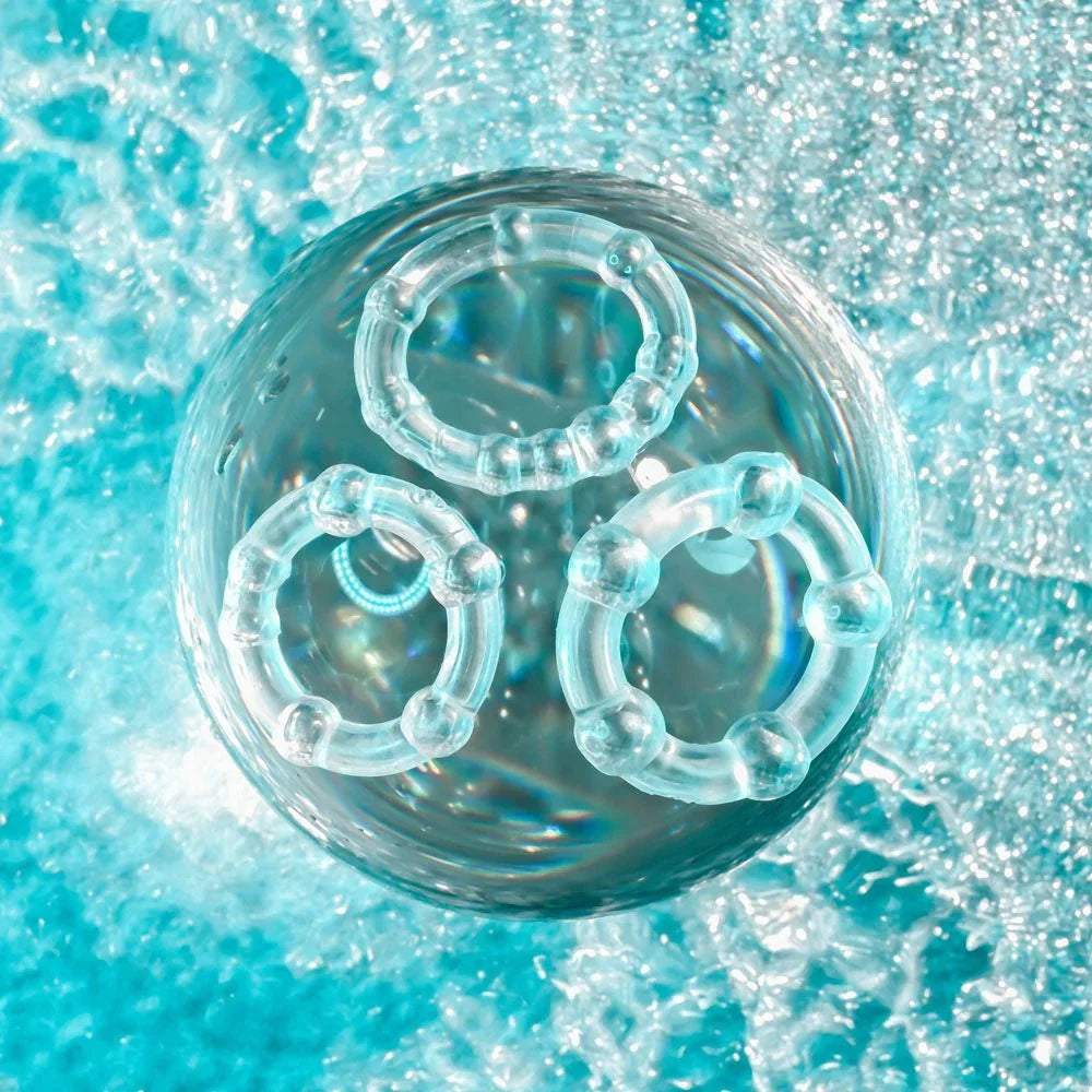 The three Selopa erection rings inside a glass sphere in rippling water