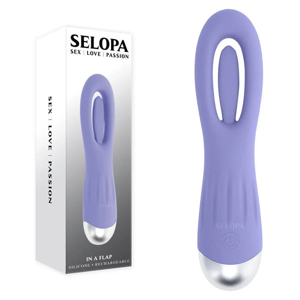 Selopa In A Flap purple flicking stimulator with a looped tip, beside its retail box