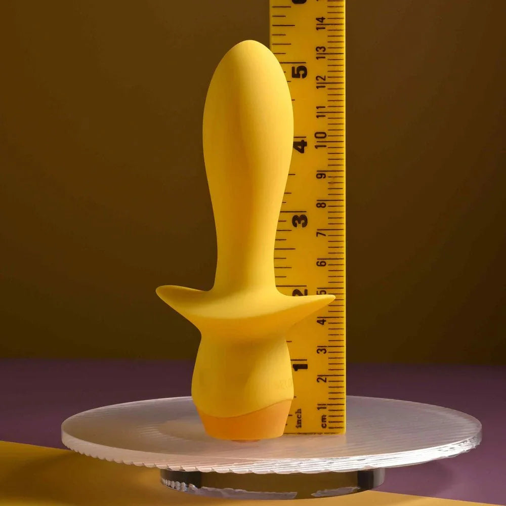 Mellow Yellow stood beside a ruler to show its 13.5 cm length