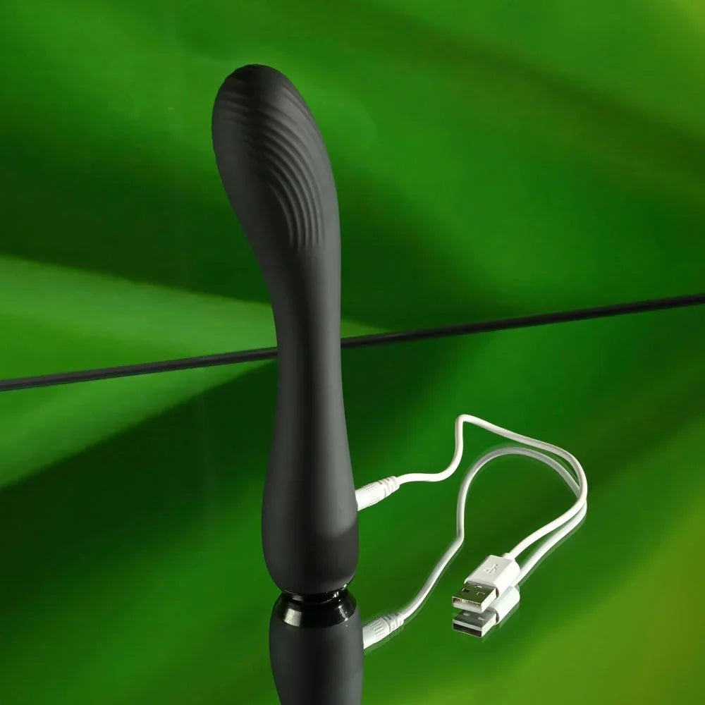 Midnight Magic with its USB charging cable connected at the base