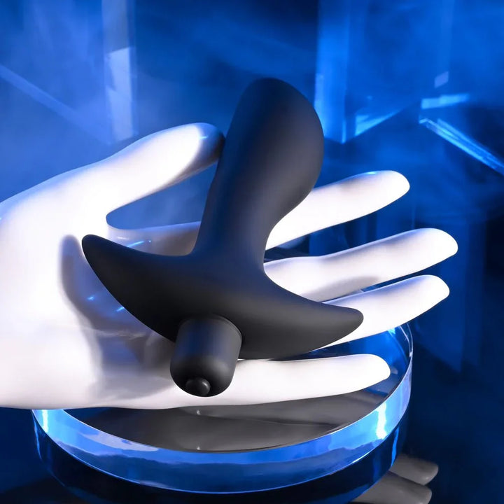 P-Spot Trainer resting on a white mannequin hand