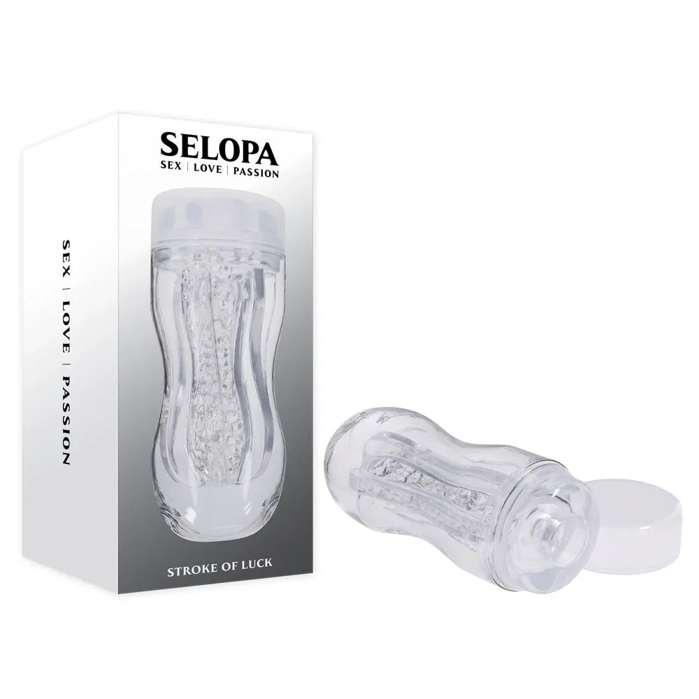 Selopa Stroke of Luck clear textured stroker beside its retail box