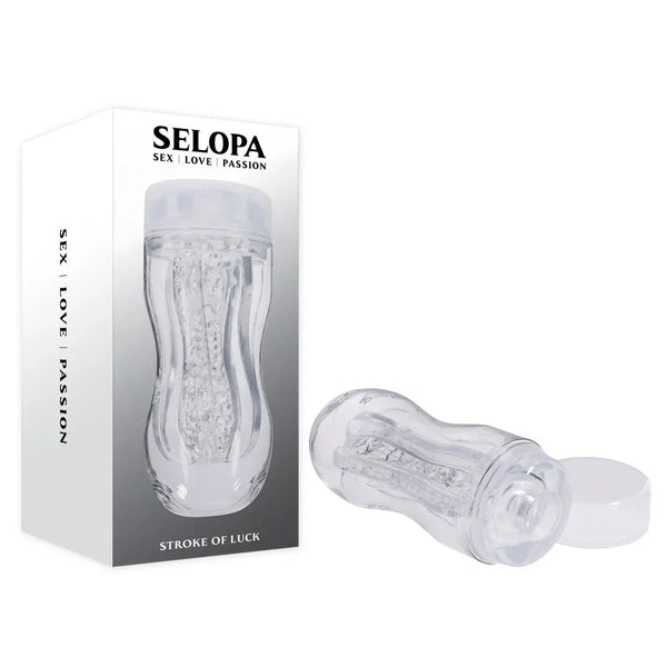 Selopa Stroke of Luck clear textured stroker beside its retail box