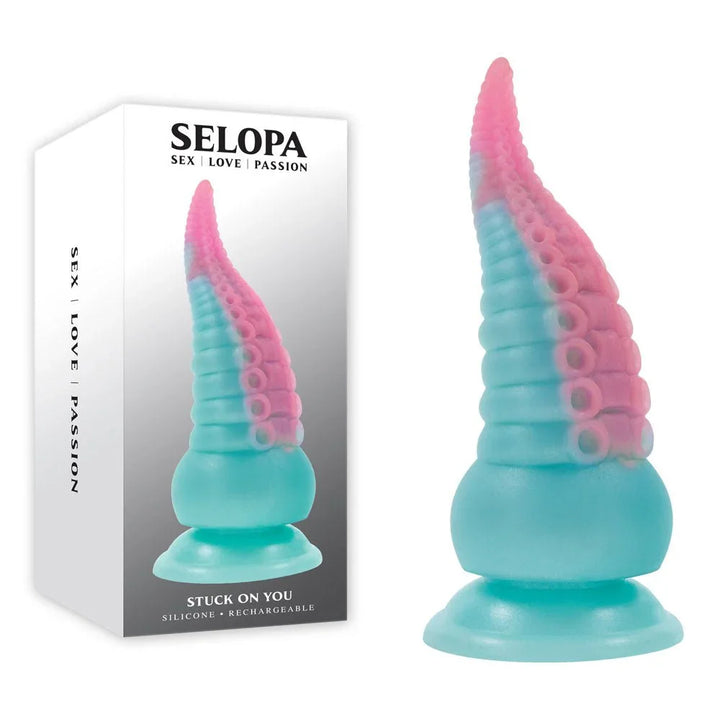 Selopa Stuck On You retail box beside the blue and pink tentacle fantasy dildo
