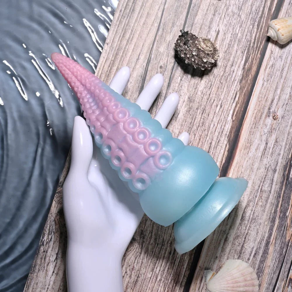 Stuck On You tentacle dildo resting on a white mannequin hand