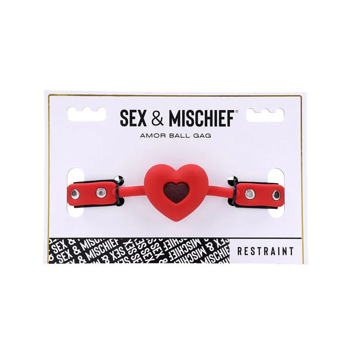 Amor Ball Gag retail card front, red heart gag on the black strap