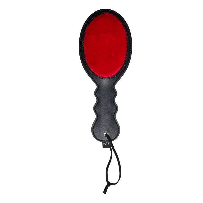 Sex & Mischief Amor Paddle, red oval face with a shaped black handle and wrist loop