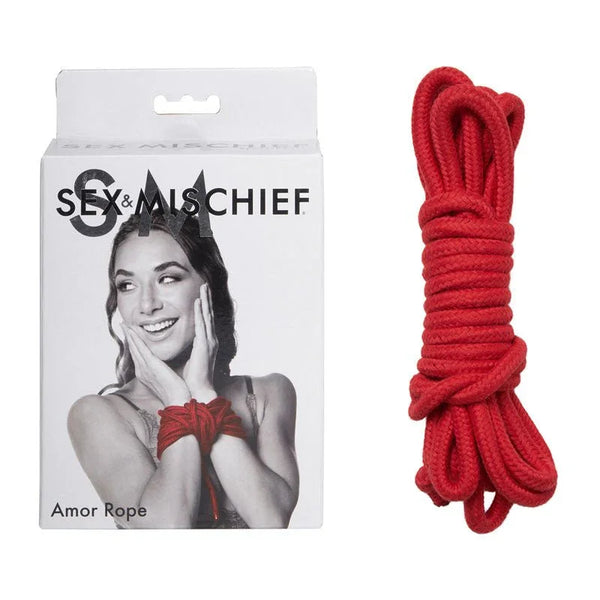Sex & Mischief Amor Rope box beside a coiled length of red cotton rope